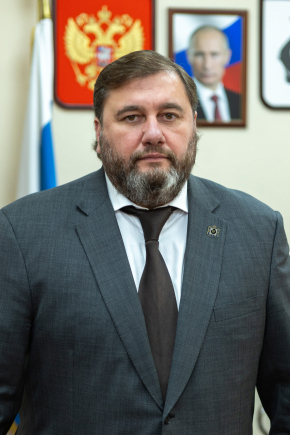 министр
